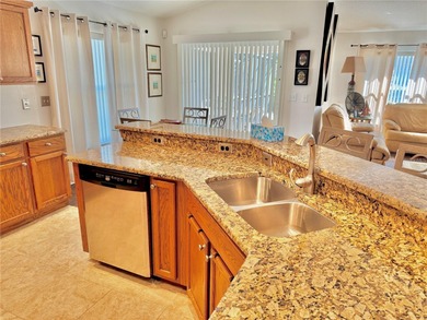 DON'T MISS THIS 4 BEDROMED 3 1/2 BATH ( 2 EN-SUITE ) WITH HEATED on Remington Golf Club in Florida - for sale on GolfHomes.com, golf home, golf lot