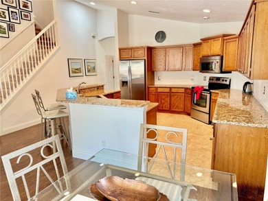 DON'T MISS THIS 4 BEDROMED 3 1/2 BATH ( 2 EN-SUITE ) WITH HEATED on Remington Golf Club in Florida - for sale on GolfHomes.com, golf home, golf lot