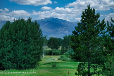 Welcome to your dream retreat at Teton Springs! Nestled among on Teton Springs Resort and Club in Idaho - for sale on GolfHomes.com, golf home, golf lot