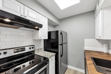 Beautifully renovated end unit with sleek new kitchen featuring on Cross Creek Golf Course in Georgia - for sale on GolfHomes.com, golf home, golf lot