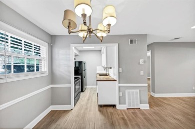 Beautifully renovated end unit with sleek new kitchen featuring on Cross Creek Golf Course in Georgia - for sale on GolfHomes.com, golf home, golf lot