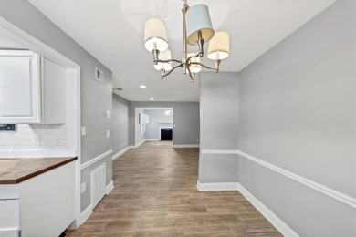 Beautifully renovated end unit with sleek new kitchen featuring on Cross Creek Golf Course in Georgia - for sale on GolfHomes.com, golf home, golf lot