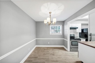 Beautifully renovated end unit with sleek new kitchen featuring on Cross Creek Golf Course in Georgia - for sale on GolfHomes.com, golf home, golf lot