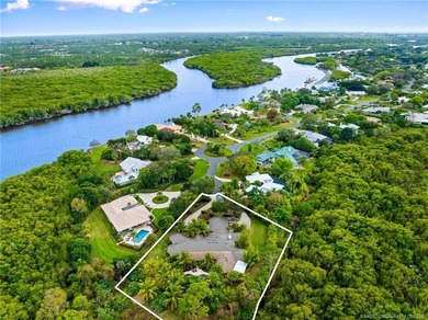 Nestled in the heart of Palm City's premier golf and boating on Pipers Landing Country Club in Florida - for sale on GolfHomes.com, golf home, golf lot