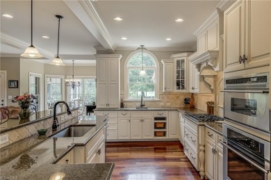 Exquisite offering in Salem Glen, overlooking the 14th Hole on Salem Glen Country Club in North Carolina - for sale on GolfHomes.com, golf home, golf lot