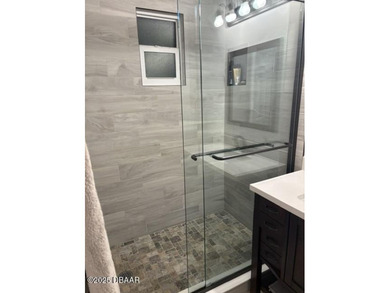 Fantastic beach house with gut renovation in 2022 including new on Oceanside Country Club in Florida - for sale on GolfHomes.com, golf home, golf lot