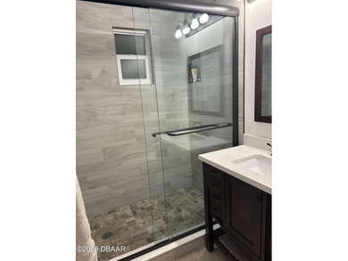 Fantastic beach house with gut renovation in 2022 including new on Oceanside Country Club in Florida - for sale on GolfHomes.com, golf home, golf lot