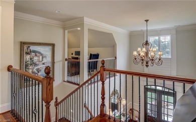 Exquisite offering in Salem Glen, overlooking the 14th Hole on Salem Glen Country Club in North Carolina - for sale on GolfHomes.com, golf home, golf lot