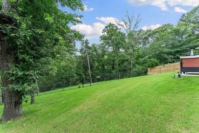 Nestled in the desirable Avondale Subdivision of Bella Vista on Bella Vista Country Club and Golf Course in Arkansas - for sale on GolfHomes.com, golf home, golf lot