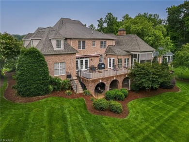 Exquisite offering in Salem Glen, overlooking the 14th Hole on Salem Glen Country Club in North Carolina - for sale on GolfHomes.com, golf home, golf lot