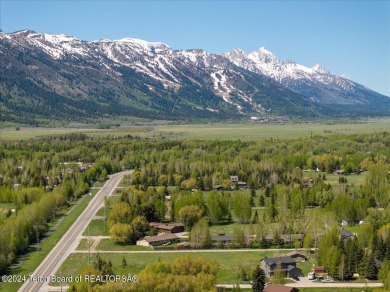 Rare vacant lot opportunity on the westbank of the Snake River on Teton Pines Golf Club in Wyoming - for sale on GolfHomes.com, golf home, golf lot