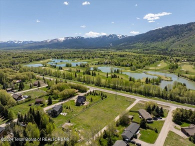 Rare vacant lot opportunity on the westbank of the Snake River on Teton Pines Golf Club in Wyoming - for sale on GolfHomes.com, golf home, golf lot