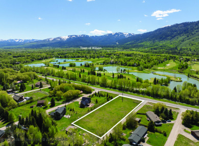 Rare vacant lot opportunity on the westbank of the Snake River on Teton Pines Golf Club in Wyoming - for sale on GolfHomes.com, golf home, golf lot