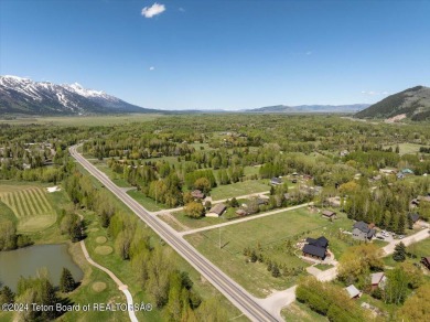 Rare vacant lot opportunity on the westbank of the Snake River on Teton Pines Golf Club in Wyoming - for sale on GolfHomes.com, golf home, golf lot