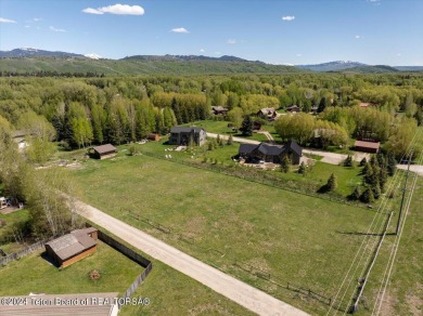 Rare vacant lot opportunity on the westbank of the Snake River on Teton Pines Golf Club in Wyoming - for sale on GolfHomes.com, golf home, golf lot