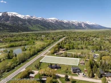 Rare vacant lot opportunity on the westbank of the Snake River on Teton Pines Golf Club in Wyoming - for sale on GolfHomes.com, golf home, golf lot