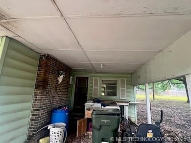 SELLER IS ENTERTAINING BACK-UP OFFERS.  MULTI-OFFER SITUATION on Lake Murray State Park Golf Course in Oklahoma - for sale on GolfHomes.com, golf home, golf lot