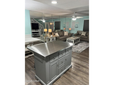 Your Coastal Oasis Awaits at 153 Gulf Highlands Blvd! STOP on Edgewater Beach Resort in Florida - for sale on GolfHomes.com, golf home, golf lot