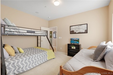 This well-positioned 5th-floor end-unit condo offers expansive on Tan-Tar-A Golf Club in Missouri - for sale on GolfHomes.com, golf home, golf lot