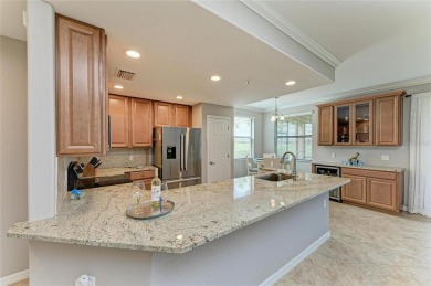 LOOKING FOR AN OPEN FLOOR PLAN COACH HOME IN RIVER STRAND, THIS on River Strand Golf and Country Club At Heritage Harbour  in Florida - for sale on GolfHomes.com, golf home, golf lot