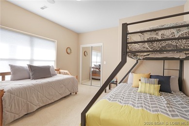 This well-positioned 5th-floor end-unit condo offers expansive on Tan-Tar-A Golf Club in Missouri - for sale on GolfHomes.com, golf home, golf lot