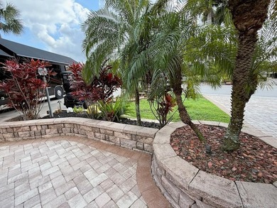 Immaculate Corner Lot with Exceptional Views & Luxury Upgrades! on St. Lucie Trail Golf Club in Florida - for sale on GolfHomes.com, golf home, golf lot