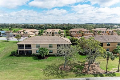 LOOKING FOR AN OPEN FLOOR PLAN COACH HOME IN RIVER STRAND, THIS on River Strand Golf and Country Club At Heritage Harbour  in Florida - for sale on GolfHomes.com, golf home, golf lot