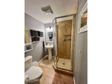 Your Coastal Oasis Awaits at 153 Gulf Highlands Blvd! STOP on Edgewater Beach Resort in Florida - for sale on GolfHomes.com, golf home, golf lot