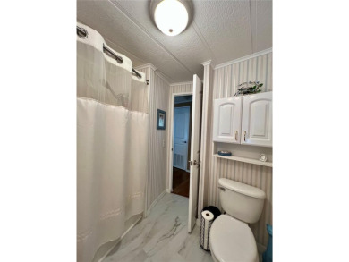 Welcome to this charming 2-bedroom, 2-bathroom home in the on Fairway Village Golf Course in Florida - for sale on GolfHomes.com, golf home, golf lot