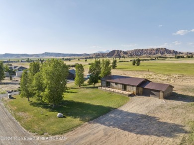 Experience maintenance-free living in this beautifully remodeled on Antelope Hills Golf Course in Wyoming - for sale on GolfHomes.com, golf home, golf lot