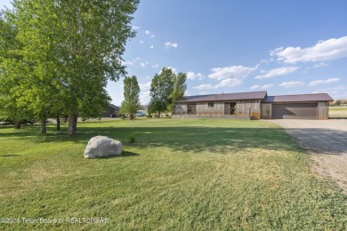 Experience maintenance-free living in this beautifully remodeled on Antelope Hills Golf Course in Wyoming - for sale on GolfHomes.com, golf home, golf lot