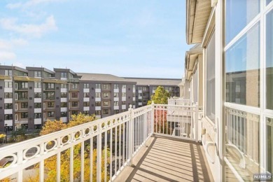 1269sf 2-bedroom, 2-bathroom with a balcony, in unit laundry, 1 on Liberty National in New Jersey - for sale on GolfHomes.com, golf home, golf lot