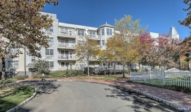 1269sf 2-bedroom, 2-bathroom with a balcony, in unit laundry, 1 on Liberty National in New Jersey - for sale on GolfHomes.com, golf home, golf lot