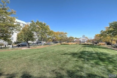 1269sf 2-bedroom, 2-bathroom with a balcony, in unit laundry, 1 on Liberty National in New Jersey - for sale on GolfHomes.com, golf home, golf lot