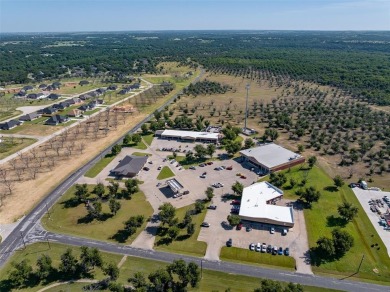 Spacious CORNER LOT located in Orchard 14 of PECAN PLANTATION on Pecan Plantation Country Club in Texas - for sale on GolfHomes.com, golf home, golf lot