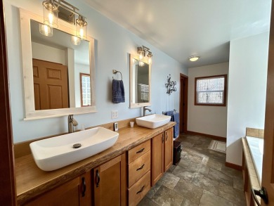 Privacy and seclusion await at this true Up North retreat! This on Forest Dunes Golf Club in Michigan - for sale on GolfHomes.com, golf home, golf lot