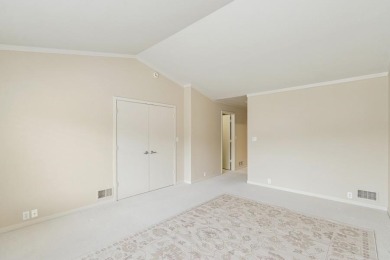 FRESH AND SLEEK CONDOMINIUM combining clean lines with practical on Elks Lodge 590 in Iowa - for sale on GolfHomes.com, golf home, golf lot