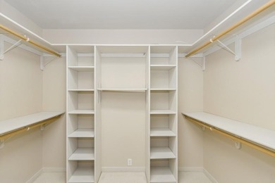 FRESH AND SLEEK CONDOMINIUM combining clean lines with practical on Elks Lodge 590 in Iowa - for sale on GolfHomes.com, golf home, golf lot