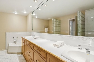 FRESH AND SLEEK CONDOMINIUM combining clean lines with practical on Elks Lodge 590 in Iowa - for sale on GolfHomes.com, golf home, golf lot