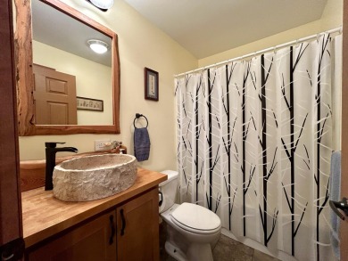 Privacy and seclusion await at this true Up North retreat! This on Forest Dunes Golf Club in Michigan - for sale on GolfHomes.com, golf home, golf lot