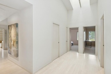 FRESH AND SLEEK CONDOMINIUM combining clean lines with practical on Elks Lodge 590 in Iowa - for sale on GolfHomes.com, golf home, golf lot
