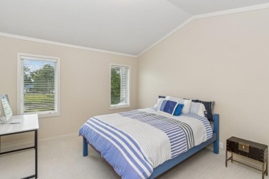 FRESH AND SLEEK CONDOMINIUM combining clean lines with practical on Elks Lodge 590 in Iowa - for sale on GolfHomes.com, golf home, golf lot