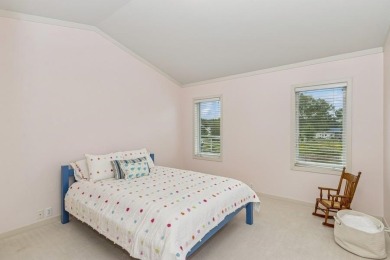 FRESH AND SLEEK CONDOMINIUM combining clean lines with practical on Elks Lodge 590 in Iowa - for sale on GolfHomes.com, golf home, golf lot