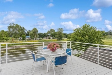 FRESH AND SLEEK CONDOMINIUM combining clean lines with practical on Elks Lodge 590 in Iowa - for sale on GolfHomes.com, golf home, golf lot