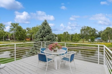FRESH AND SLEEK CONDOMINIUM combining clean lines with practical on Elks Lodge 590 in Iowa - for sale on GolfHomes.com, golf home, golf lot