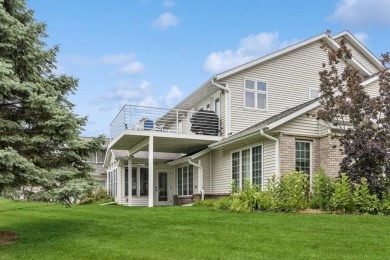 FRESH AND SLEEK CONDOMINIUM combining clean lines with practical on Elks Lodge 590 in Iowa - for sale on GolfHomes.com, golf home, golf lot