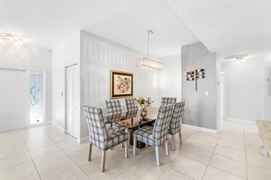 This charming first-floor condo offers comfortable living with on Polo Club of Boca Raton in Florida - for sale on GolfHomes.com, golf home, golf lot