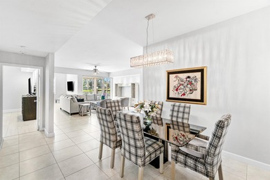 This charming first-floor condo offers comfortable living with on Polo Club of Boca Raton in Florida - for sale on GolfHomes.com, golf home, golf lot