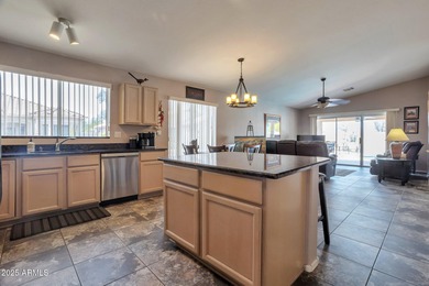 Nestled in a vibrant, active community with scenic golf courses on Coyote Lakes Golf Club in Arizona - for sale on GolfHomes.com, golf home, golf lot