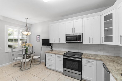 This charming first-floor condo offers comfortable living with on Polo Club of Boca Raton in Florida - for sale on GolfHomes.com, golf home, golf lot